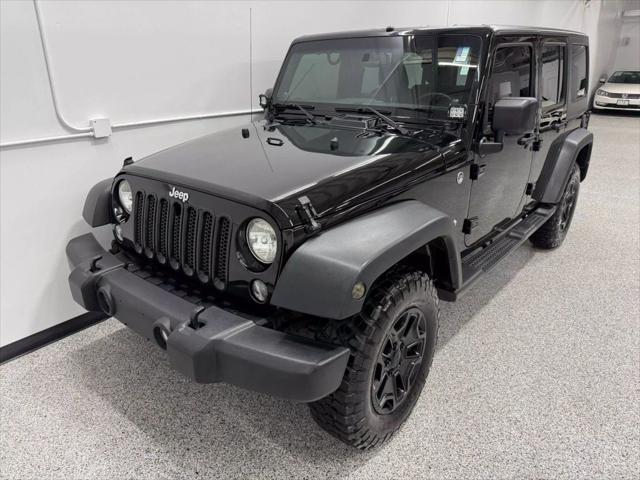 used 2014 Jeep Wrangler Unlimited car, priced at $18,595