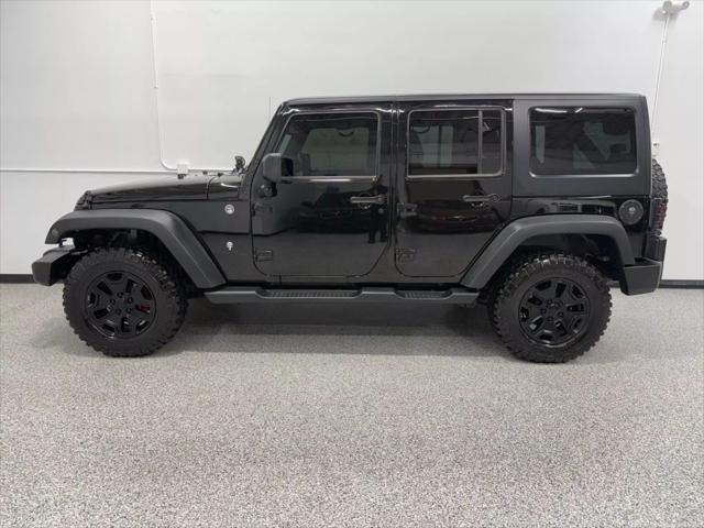 used 2014 Jeep Wrangler Unlimited car, priced at $18,595