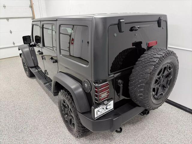 used 2014 Jeep Wrangler Unlimited car, priced at $18,595