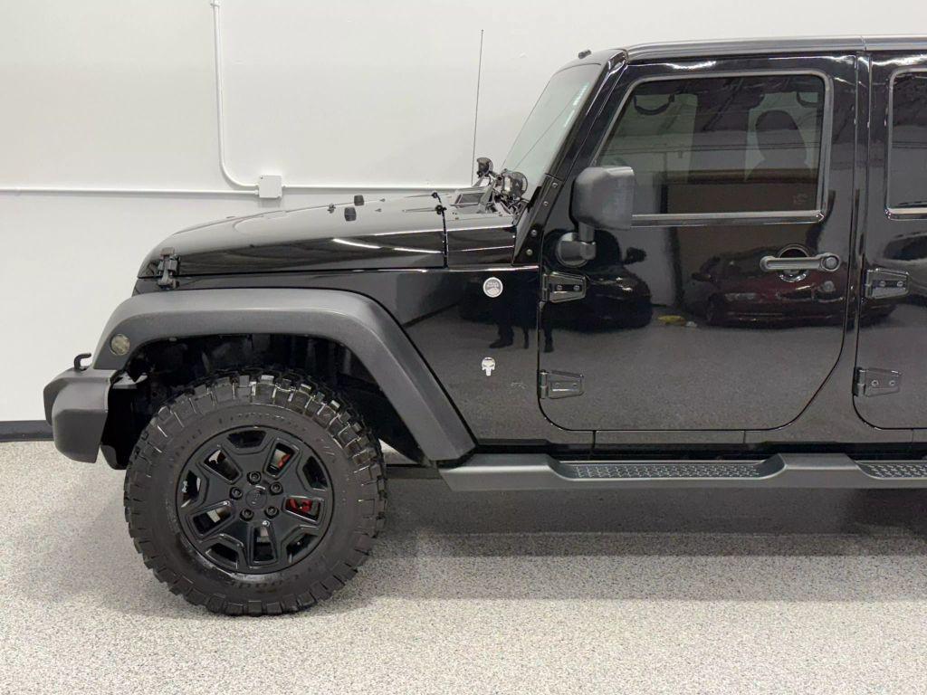 used 2014 Jeep Wrangler Unlimited car, priced at $17,995