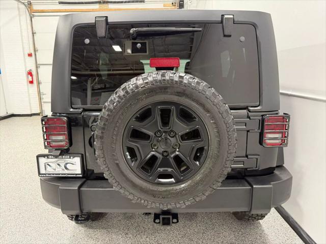 used 2014 Jeep Wrangler Unlimited car, priced at $18,595