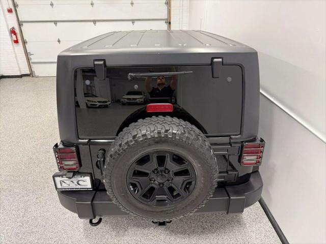 used 2014 Jeep Wrangler Unlimited car, priced at $18,595