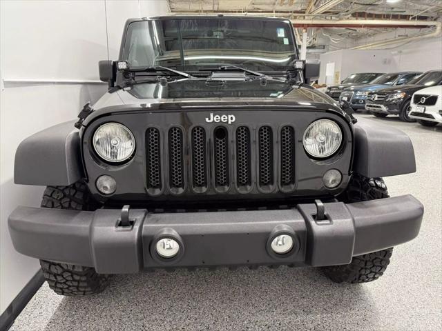 used 2014 Jeep Wrangler Unlimited car, priced at $18,595