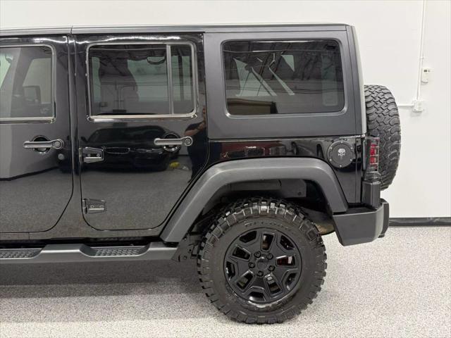 used 2014 Jeep Wrangler Unlimited car, priced at $18,595