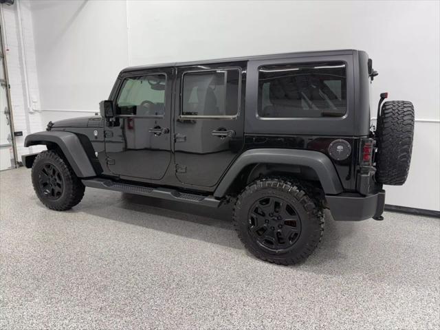 used 2014 Jeep Wrangler Unlimited car, priced at $18,595