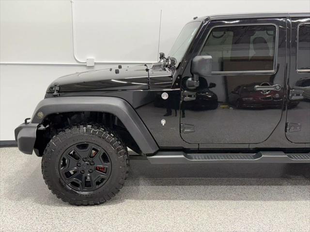 used 2014 Jeep Wrangler Unlimited car, priced at $18,595