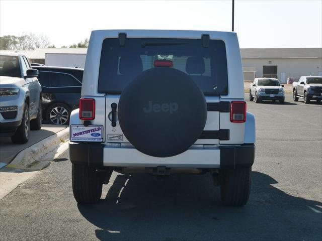 used 2011 Jeep Wrangler Unlimited car, priced at $15,987