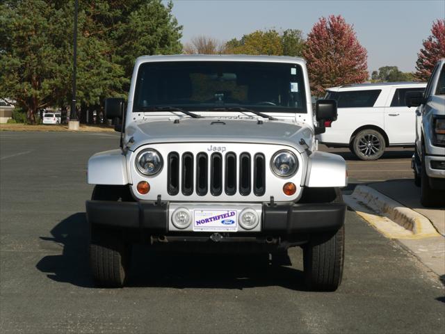 used 2011 Jeep Wrangler Unlimited car, priced at $15,987