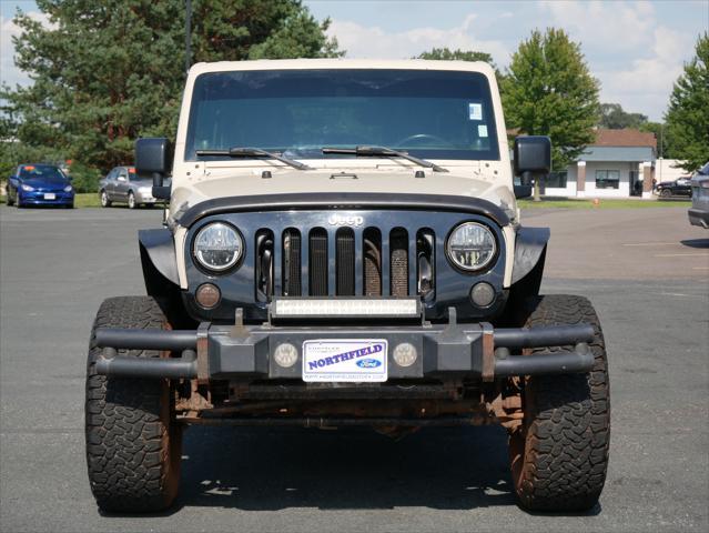 used 2011 Jeep Wrangler Unlimited car, priced at $13,987