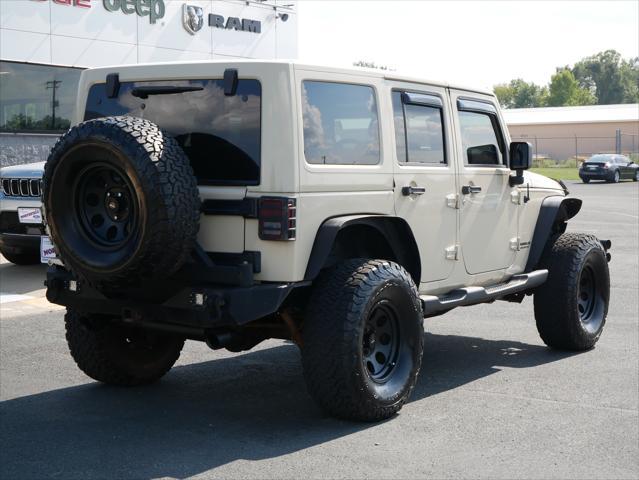 used 2011 Jeep Wrangler Unlimited car, priced at $13,987