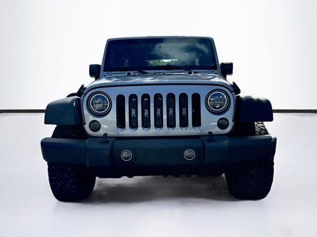 used 2016 Jeep Wrangler Unlimited car, priced at $17,761