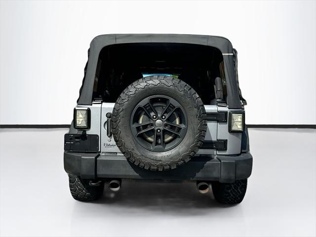 used 2016 Jeep Wrangler Unlimited car, priced at $17,761