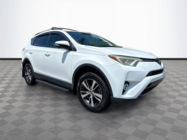 used 2018 Toyota RAV4 car, priced at $13,993