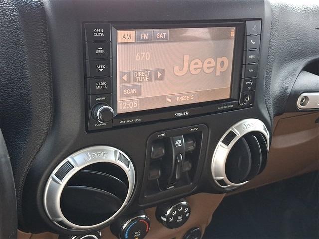 used 2012 Jeep Wrangler Unlimited car, priced at $12,426