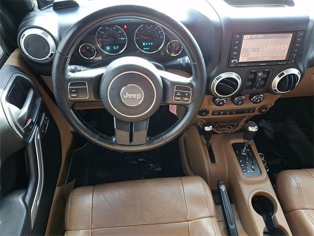 used 2012 Jeep Wrangler Unlimited car, priced at $12,426
