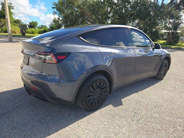 used 2023 Tesla Model Y car, priced at $30,900