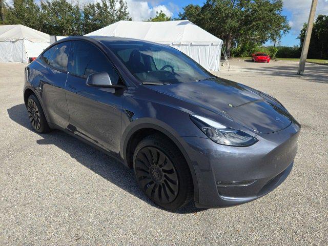 used 2023 Tesla Model Y car, priced at $30,900