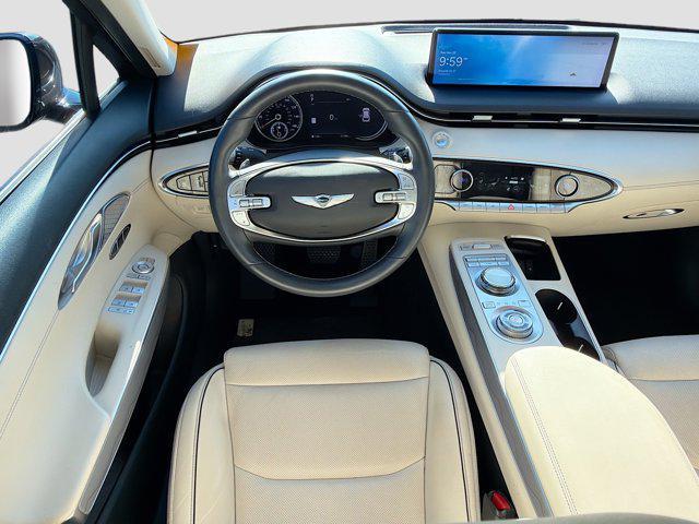 used 2023 Genesis GV70 car, priced at $35,271