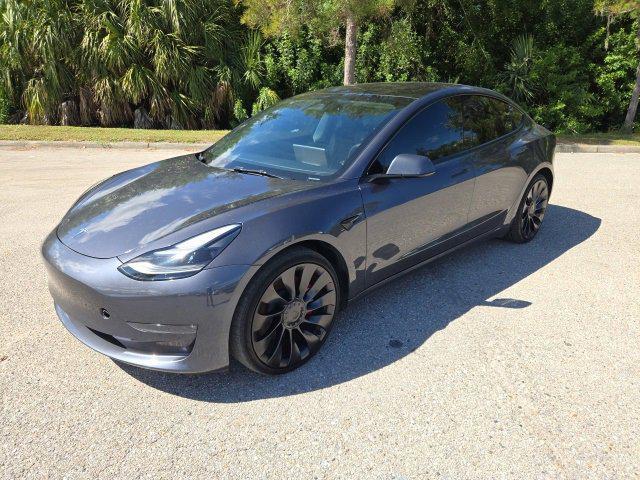 used 2023 Tesla Model 3 car, priced at $29,560