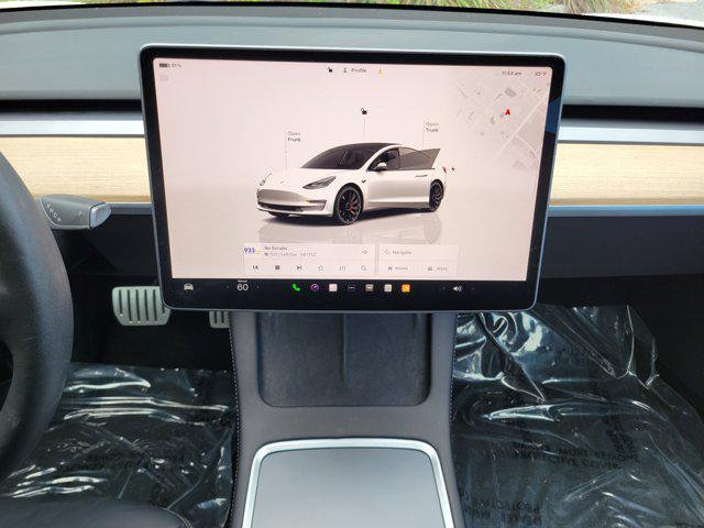 used 2022 Tesla Model 3 car, priced at $27,556
