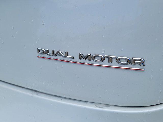 used 2022 Tesla Model 3 car, priced at $27,556