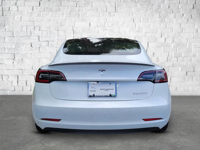 used 2022 Tesla Model 3 car, priced at $27,556