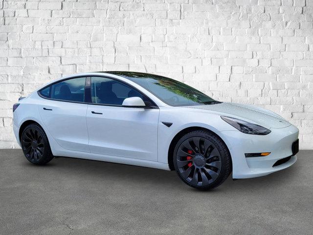 used 2022 Tesla Model 3 car, priced at $27,556