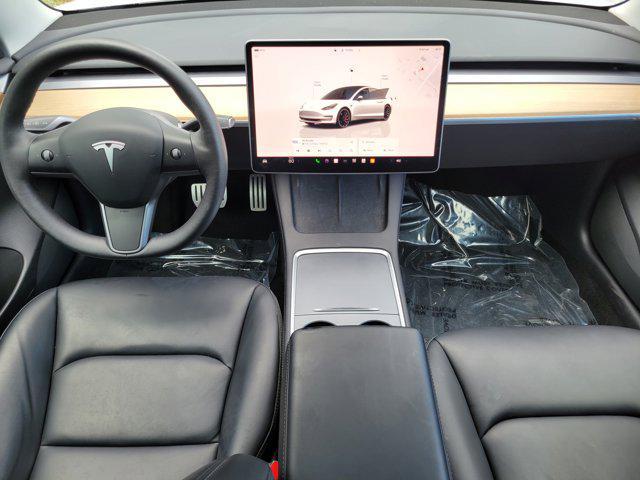 used 2022 Tesla Model 3 car, priced at $27,556
