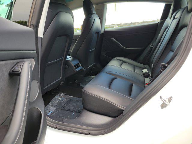 used 2022 Tesla Model 3 car, priced at $27,556