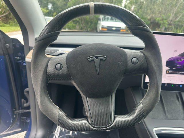 used 2024 Tesla Model Y car, priced at $34,559