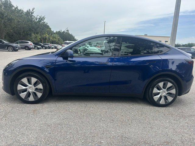 used 2024 Tesla Model Y car, priced at $34,559