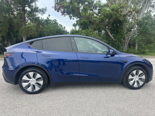 used 2024 Tesla Model Y car, priced at $34,559
