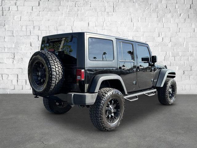 used 2017 Jeep Wrangler Unlimited car, priced at $19,446