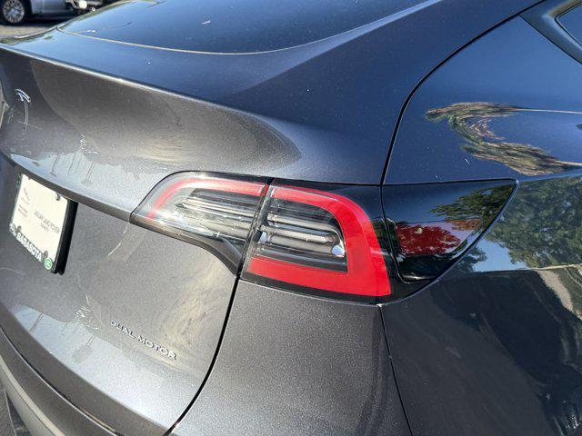 used 2024 Tesla Model Y car, priced at $35,894