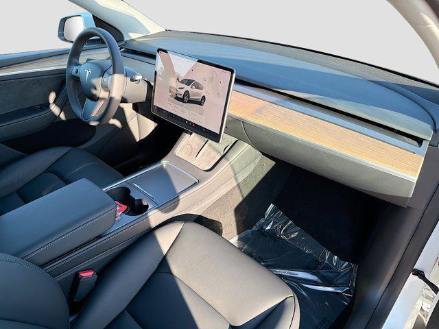 used 2023 Tesla Model Y car, priced at $31,400