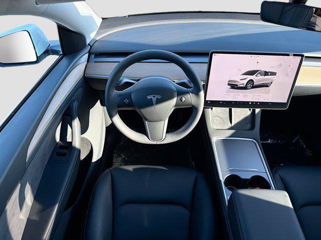 used 2023 Tesla Model Y car, priced at $31,400