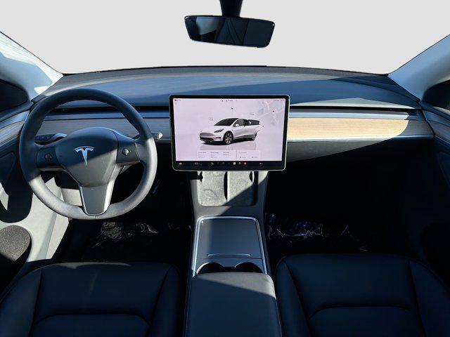 used 2023 Tesla Model Y car, priced at $31,400
