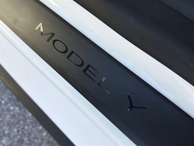 used 2023 Tesla Model Y car, priced at $31,400
