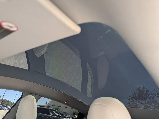 used 2023 Tesla Model Y car, priced at $30,757
