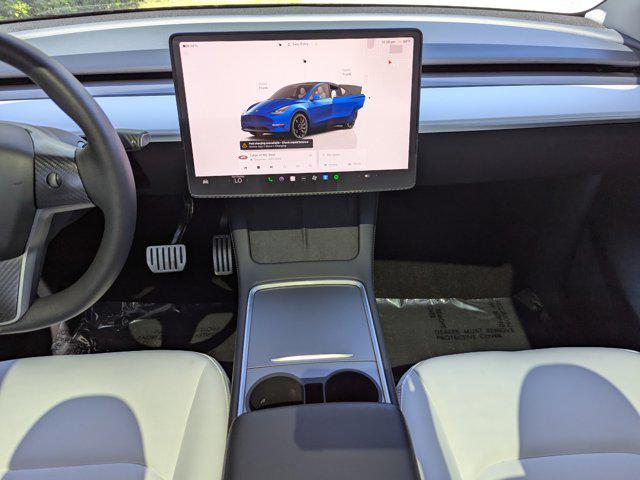 used 2023 Tesla Model Y car, priced at $30,757