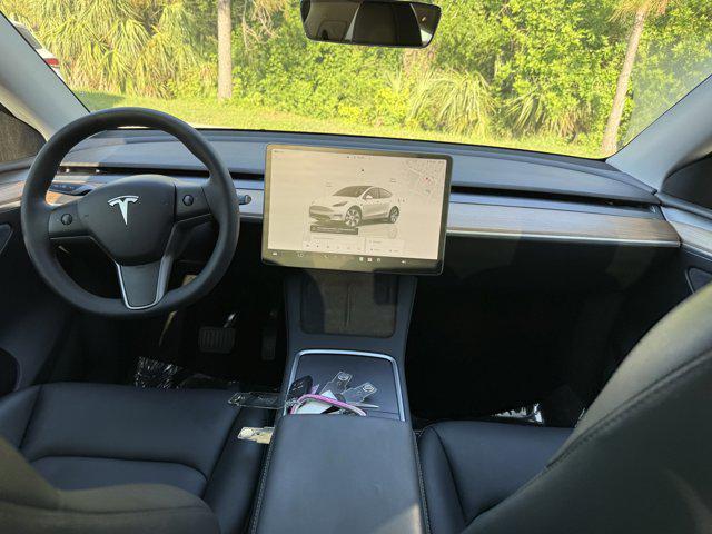 used 2023 Tesla Model Y car, priced at $32,599