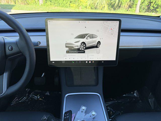 used 2023 Tesla Model Y car, priced at $32,599