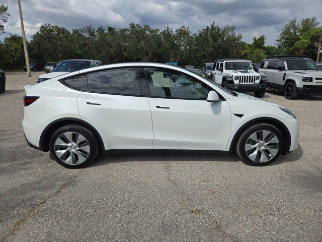 used 2023 Tesla Model Y car, priced at $30,054
