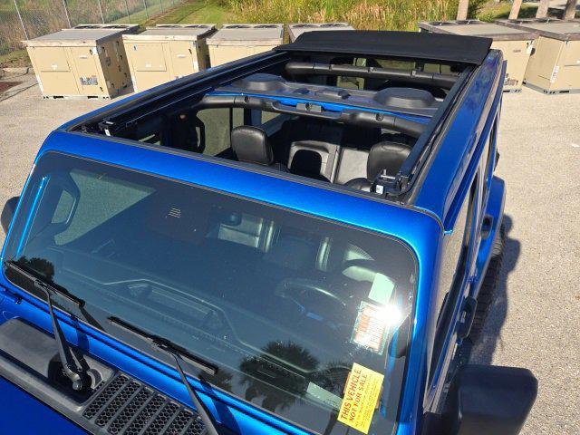 used 2021 Jeep Wrangler Unlimited car, priced at $34,135