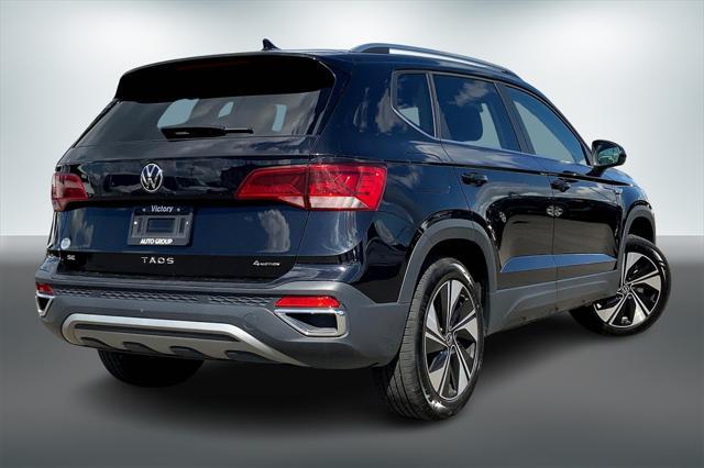 used 2024 Volkswagen Taos car, priced at $22,500