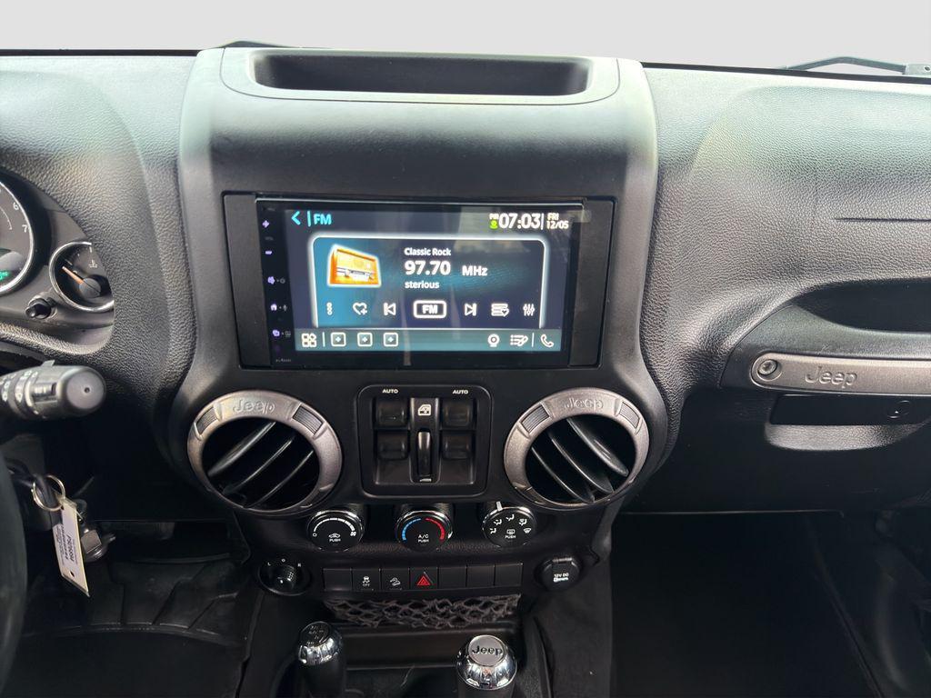 used 2018 Jeep Wrangler JK Unlimited car, priced at $23,995