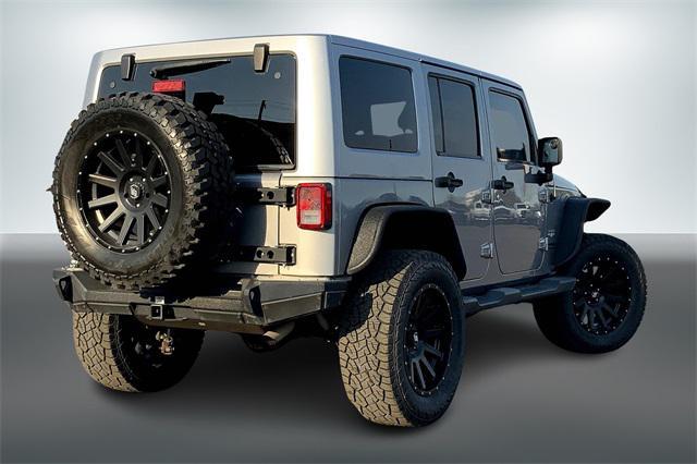 used 2015 Jeep Wrangler Unlimited car, priced at $21,777