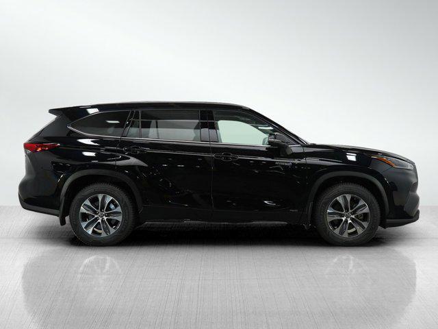 used 2021 Toyota Highlander Hybrid car, priced at $37,599