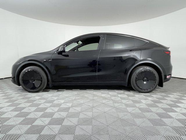 used 2024 Tesla Model Y car, priced at $34,302