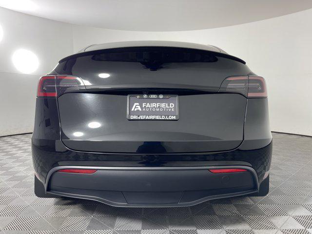 used 2024 Tesla Model Y car, priced at $34,302